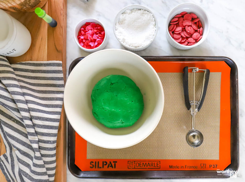 grinch cookies ingredients on sheet pan