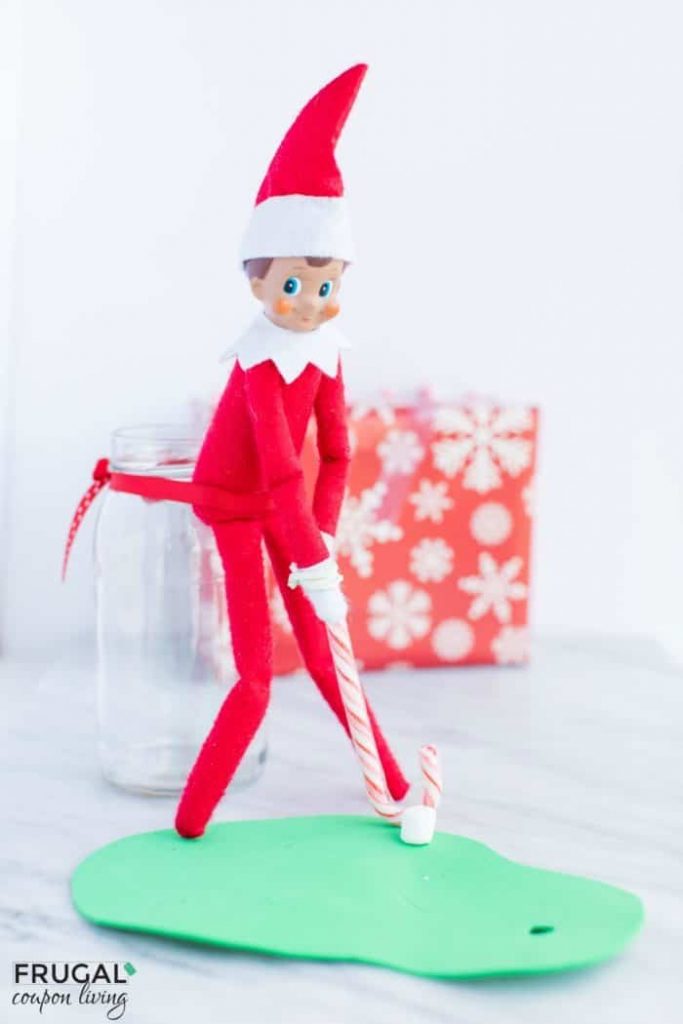 Elf plays golf