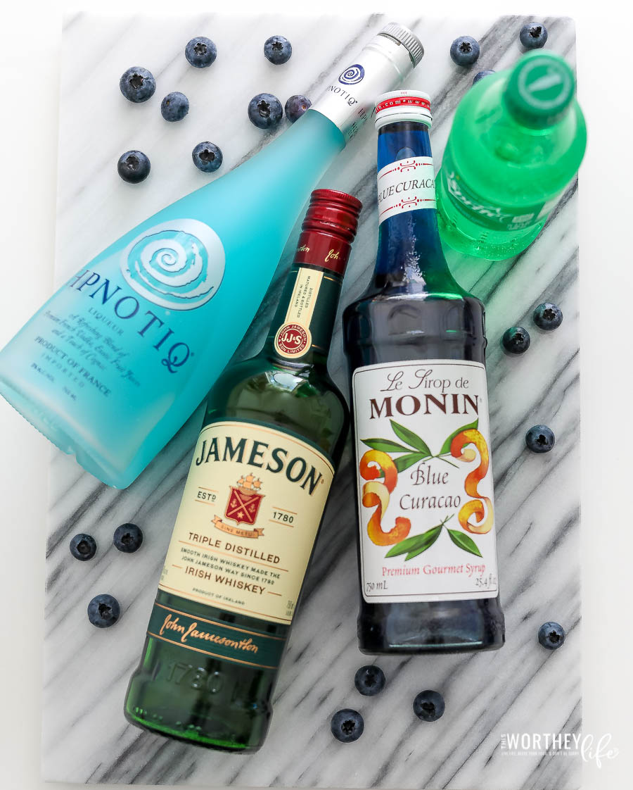 Ingredients needed for a Blue Whiskey Cccktail