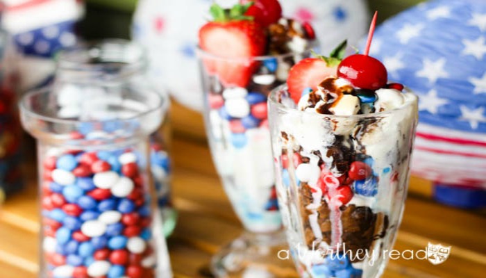 Easy summer dessert involving chocolate, candy, brownies and your favorite ice-cream! Great for a 4th of July Treat! Red, White and Blue Ice Cream & Brownie Parfaits