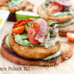 Open Face Alaskan Pollock Burgers with Bacon, Lettuce and Tomato with Lime Herb Mayo.