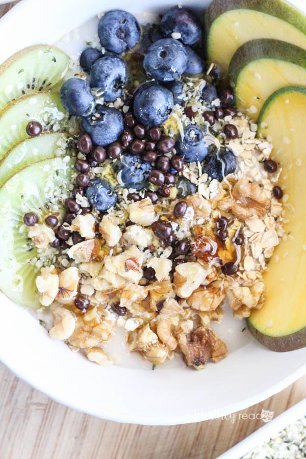 Here's an easy breakfast idea for the non-dairy fans. Smoothie bowls, yogurt bowls are quite popular these days, and this Kiwi, Blueberry & Mango Non-Dairy Yogurt Bowl will soon become a favorite for breakfast. It combines several fruits (Kiwi, Blueberries, and Mango) and necessary essentials (Hemp Hearts, California Walnuts, Vegan Oatmeal) to start your day off on the right foot! 