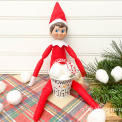 Elf On The Shelf Ideas: Check out our fun Snowball Fight Elf On the Shelf idea that is perfect for a budget friendly Elf idea your kids will love!