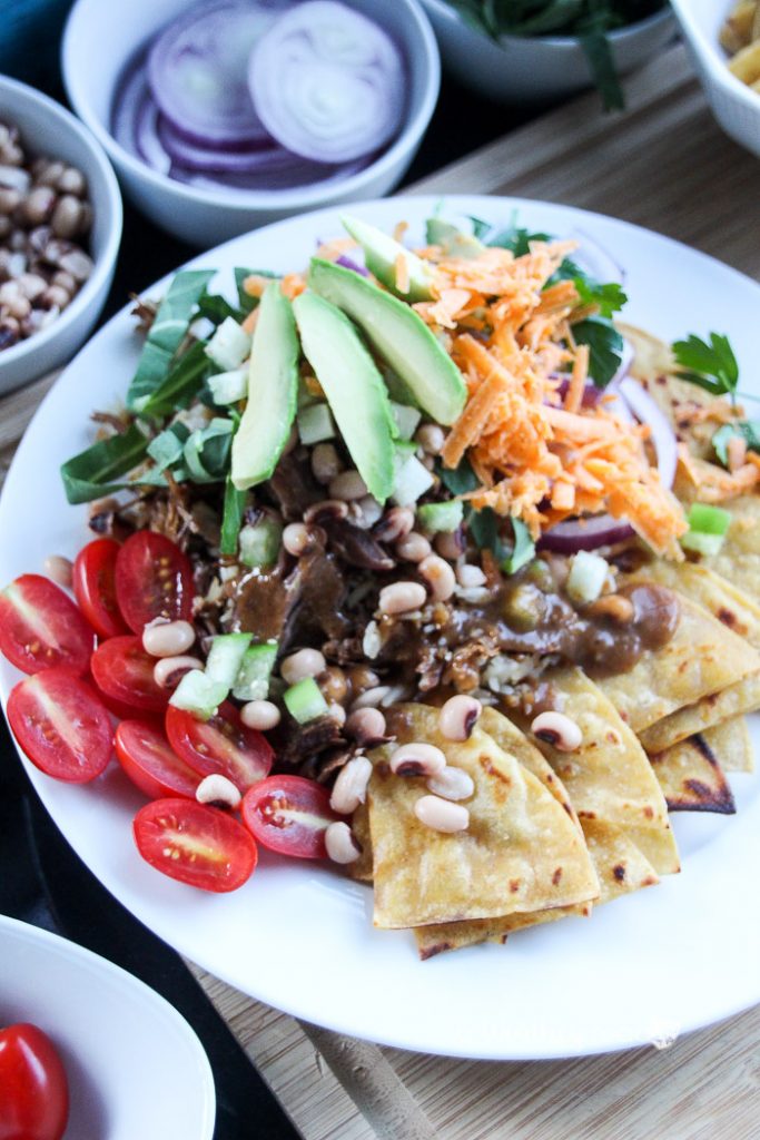 Ring in the New Year with this lucky meal: pork, greens and black eye peas. Plus, it's an easy Nacho recipe you can make any time of the year- Lucky Pork & Black Eye Peas Nachos