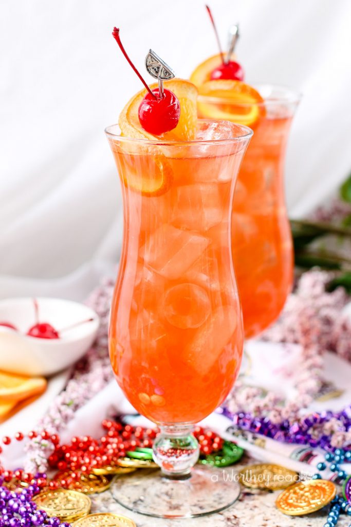 "Laissez les bons temps rouler!" Celebrate Mardi Gras with our take on the Classic Hurricane Cocktail. Mixed with spiced rum, coconut rum, mango passion fruit juice, and bourbon-spiked Maraschino cherry syrup, and a few other ingredients, this is a celebratory cocktail worth making over and over again. Turn up! Cheers!