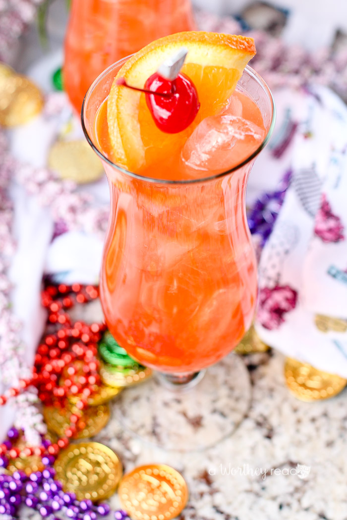 Celebrate Mardi Gras with this Classic Hurricane Cocktail. Mixed with rum, coconut rum, passion fruit juice and simple syrup.