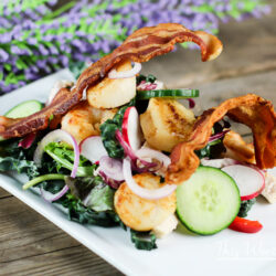 Salads are the perfect light summer meal ideas to make! We took your original surf + turf recipe to make the ultimate surf + turf salad. Loaded with chicken, scallops, and bacon, this summer salad recipe is bangin' with a ton of delicious goodness! Get the recipe on the blog- The Ultimate Turf + Surf Summer Salad