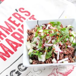 A farmer's market salad mixed with fresh veggies, red quinoa made in the instant pot, with cranberries and walnuts. Try our Red Quinoa Salad, a healthy salad recipe to enjoy any time of the year.