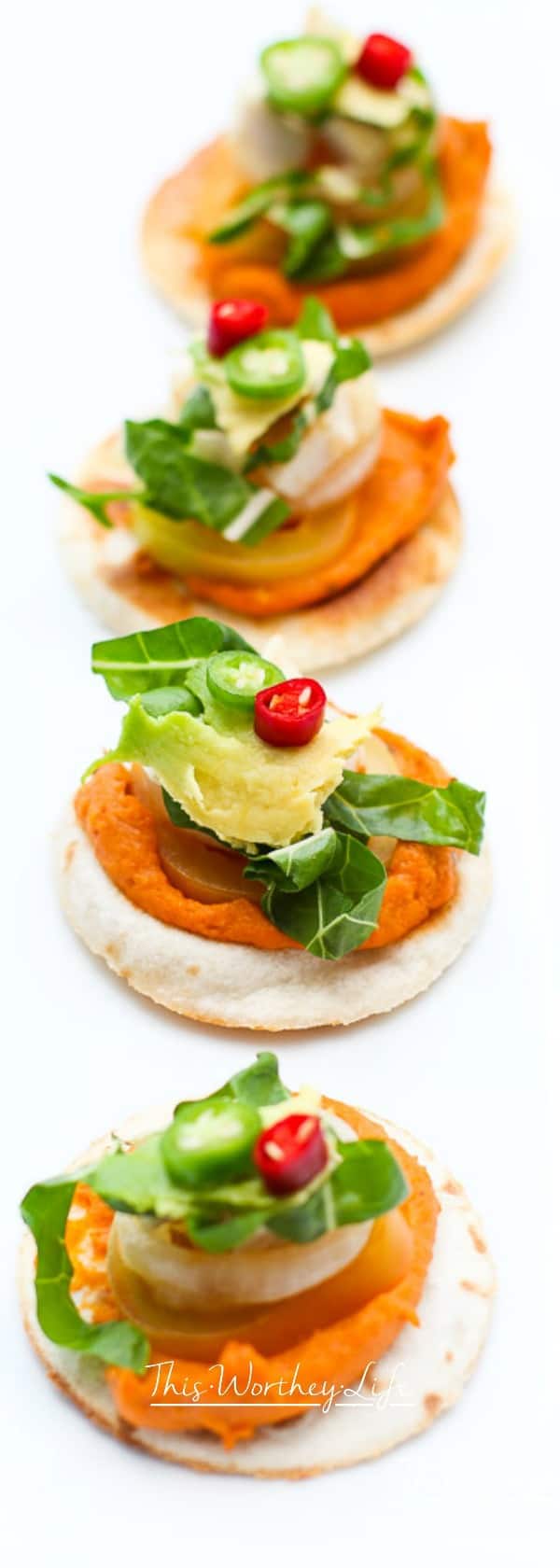 Get ready for game day with our fun appetizer using Sabra's Taco Inspired Hummus, plus chicken, fresh vegetables, laid on a flour tortilla.  This easy appetizer will also be great to serve over the holidays, including Christmas appetizers, and a New Year's Eve party. Plus, when you're getting ready for the Superbowl, this chicken and hummus appetizer will be a crowd favorite!