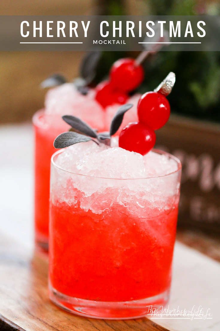 Get Christmas in a cup with our Cherry Christmas mocktail idea. Filled with cherry soda, peppermint syrup, and cherries, this frozen drink idea is a great drink idea for your holiday party.
