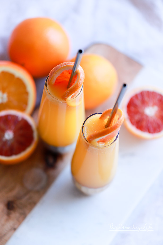 Ring in the New Year with a Honey Orange Mimosa Cocktail. Paired with a Honey Walnut Cookie, these recipes are great for parties, a girl's night out, brunch, or breakfast and dessert in bed.