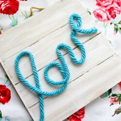 Make a love sign on a wood pallet