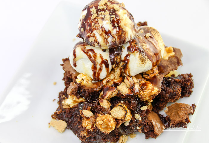 Get creative with homemade brownies and popcorn. See how we created this easy brownie dessert idea, the Popcorn S’mores Brownie Dessert! It's filled with chocolatey goodness, popcorn, caramel, and of course, ice-cream! 