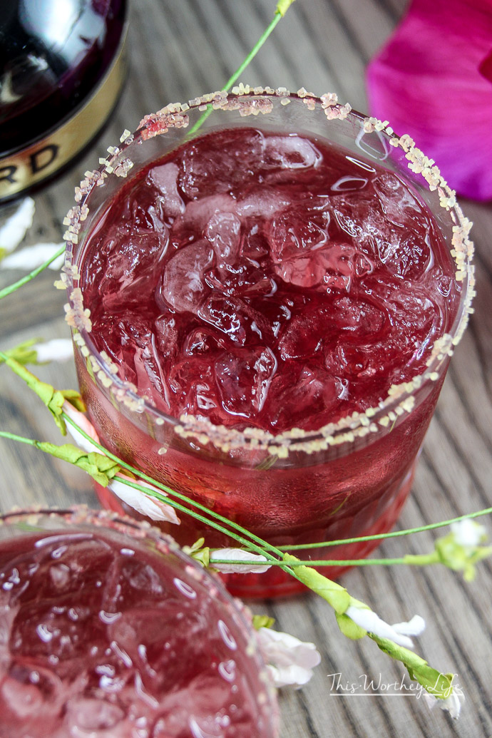 With National Margarita just around the corner, we're mixing up the classic margarita with a Raspberry Margarita. It's so good, it's a dream. With homemade raspberry simple syrup, grabbed the Chambord, a fresh squeeze of lime juice, and a long pour of gold tequila, give our Raspberry Margarita a try!