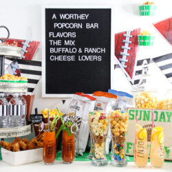 Create the ultimate popcorn bar for your next movie night in, game day watch party, awards party, birthday party, or upcoming celebration. A popcorn bar is a fun way to showcase a variety of popcorn flavors in unique and creative ways.