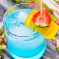 Toast to Marvel's Black Panther movie with our Vibranium cocktail made with hpnotiq liqueur. This hpnotiq drink is a beautiful, pastel blue drink- perfect to serve at any party. Cheers to Marvel's Black Panther movie, featuring a black superhero! 