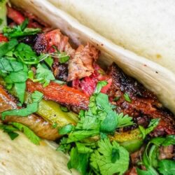 Take a foodie adventure down to Kansas City, Kansas. There you will find some of the best places to eat in Kansas City, an upcoming and foodie town with some great BBQ joints, authentic tacos, and delicious pizza.