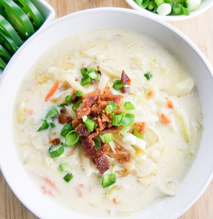 The weather may be warm, but this Instant Soup recipe is one you will not only want to make in the winter, but in spring, summer, and fall. Our homemade Creamy Cabbage Soup is filled with fresh ingredients, a fine cheese, caramelized onions, fresh cabbage, and topped with thick-cut bacon. Yes, this recipe is drool-worthy, hearty, and will leave you wanting more. It's just that good.