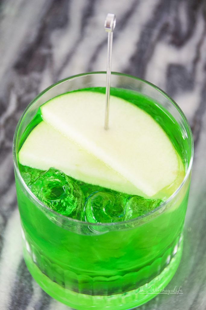 We're dedicating this green apple vodka to Gamora, first seen in Guardians of the Galaxy. Gamora plays an important role in Infinity War, and we get to see quite a bit of dialogue between Gamora and Thanos. This Honeycrisp vodka mixed with Midori Melon and green apple soda pays homage to Gamora.