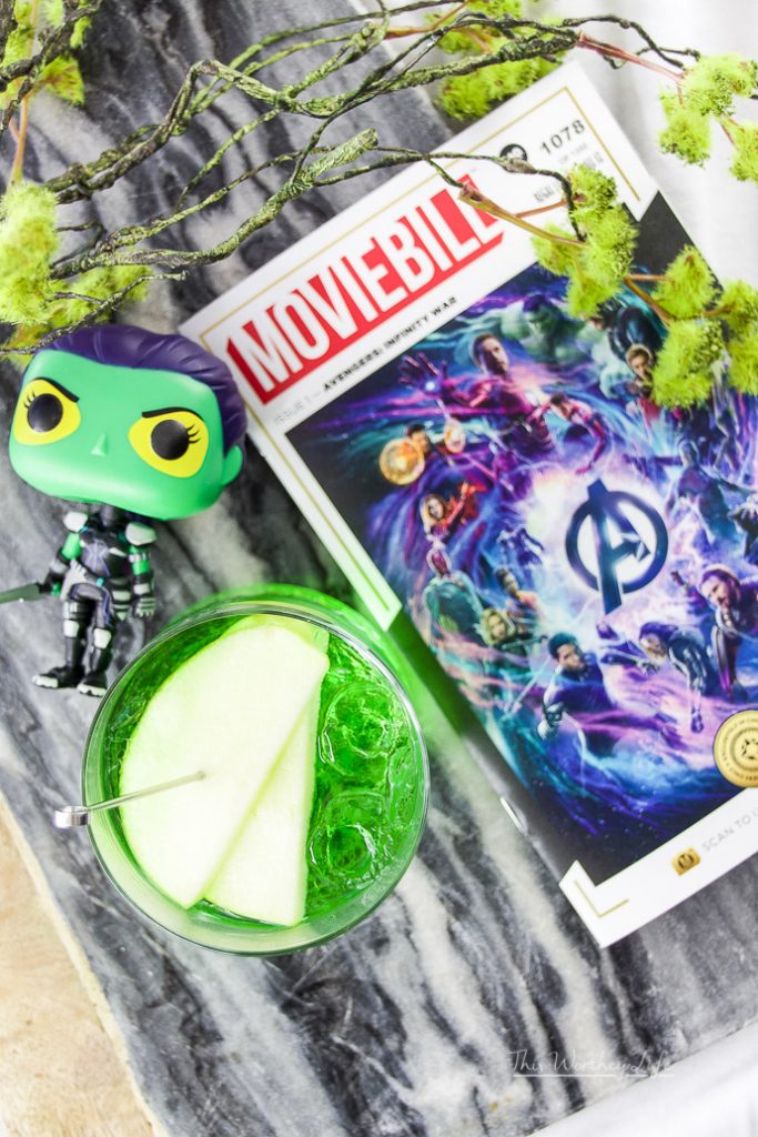 We're dedicating this green apple vodka to Gamora, first seen in Guardians of the Galaxy. Gamora plays an important role in Infinity War, and we get to see quite a bit of dialogue between Gamora and Thanos. This Honeycrisp vodka mixed with Midori Melon and green apple soda pays homage to Gamora.