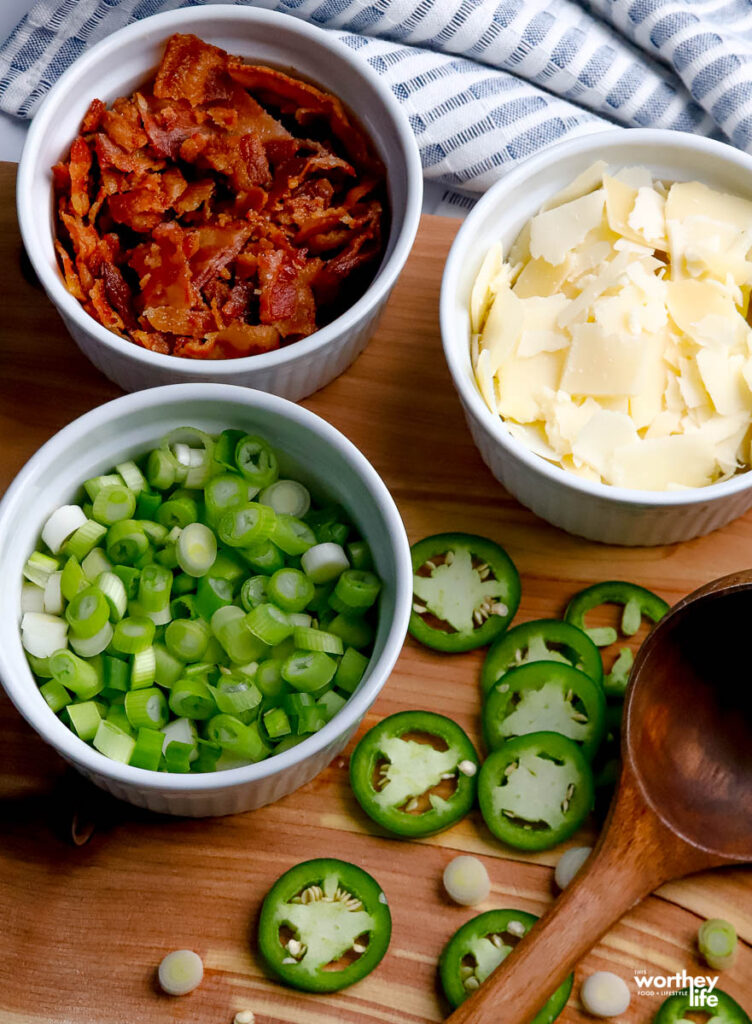 white bowls with onions, bacon and fresh cheese