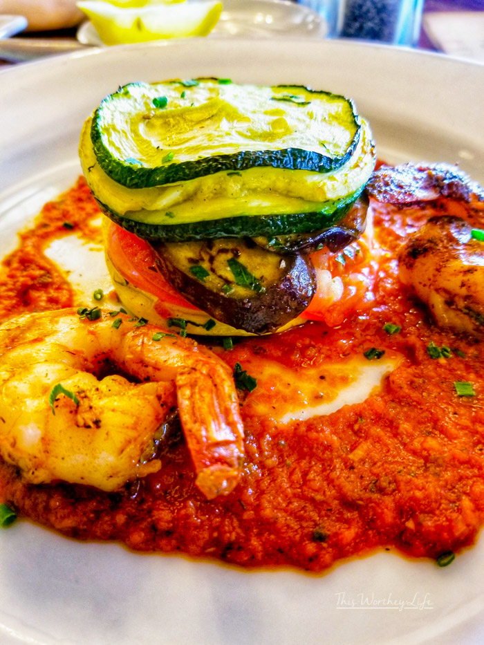 New Orleans Square, Café Orleans will be serving up a themed three-course meal inspired by the Disney•Pixar film “Ratatouille.” The first course features a specialty cheese flight with three cheeses, dried fruit, and honeycomb. For the main event, it’s Remy’s favorite dish – Shrimp Ratatouille Byaldi layered with roasted zucchini, yellow squash, eggplant, and tomato. The third course will feature Berry-Stuffed Beignets à la Mode served with a sweet brie drizzle and mascarpone.