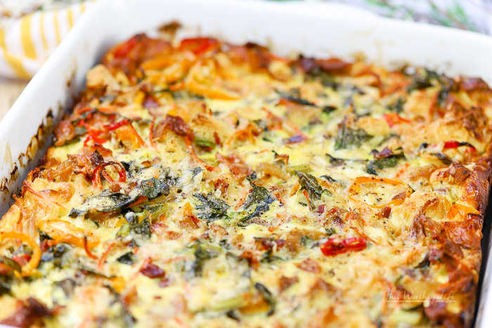 Take breakfast to a new level with our loaded bacon + peppers breakfast strata! Oozing with a variety of cheeses, fresh peppers, thick-cut bacon, collard greens, onions and more, this loaded strata says, breakfast is served!