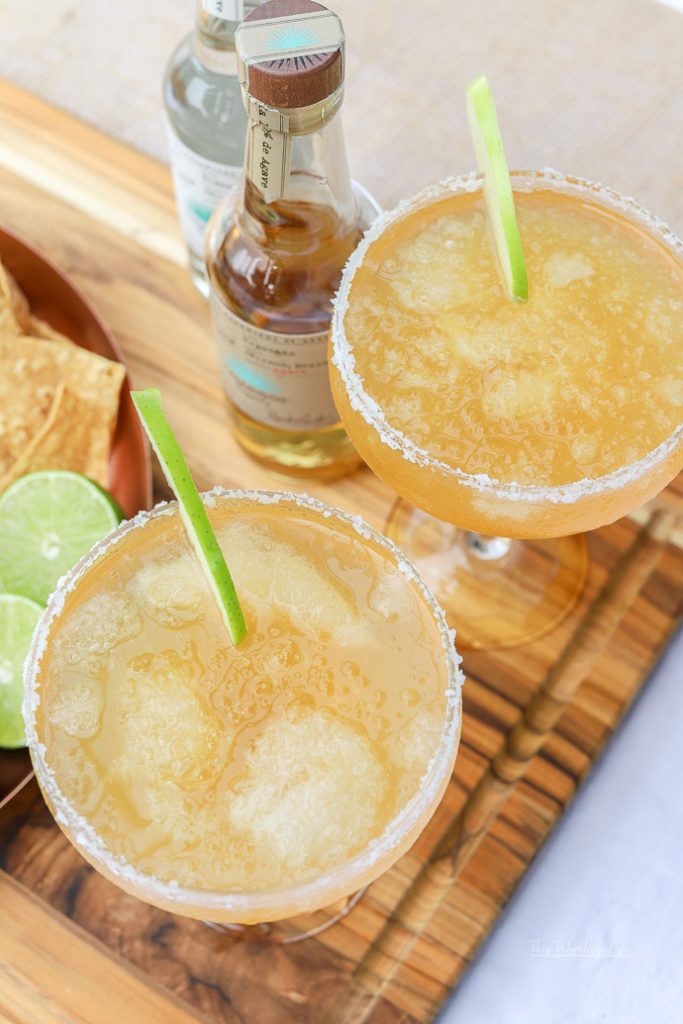 Fall is just around the corner, and with it comes all things apple cider. We're putting a twist on the classic margarita with more tequila, lime juice, and tons of apple cider to make an Apple Cider Margarita! Grab the recipe on the blog!