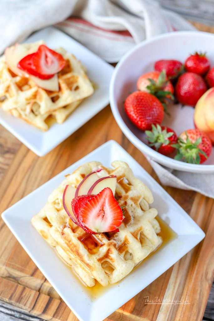 Use our breakfast hack on making "homemade" waffles with pancake mix. With fresh fruit such as strawberries and white peaches, this easy waffle recipe can be made in just a few minutes, which is perfect for those busy school mornings.  Easy Waffle Recipe | Strawberry + White Peach Waffles