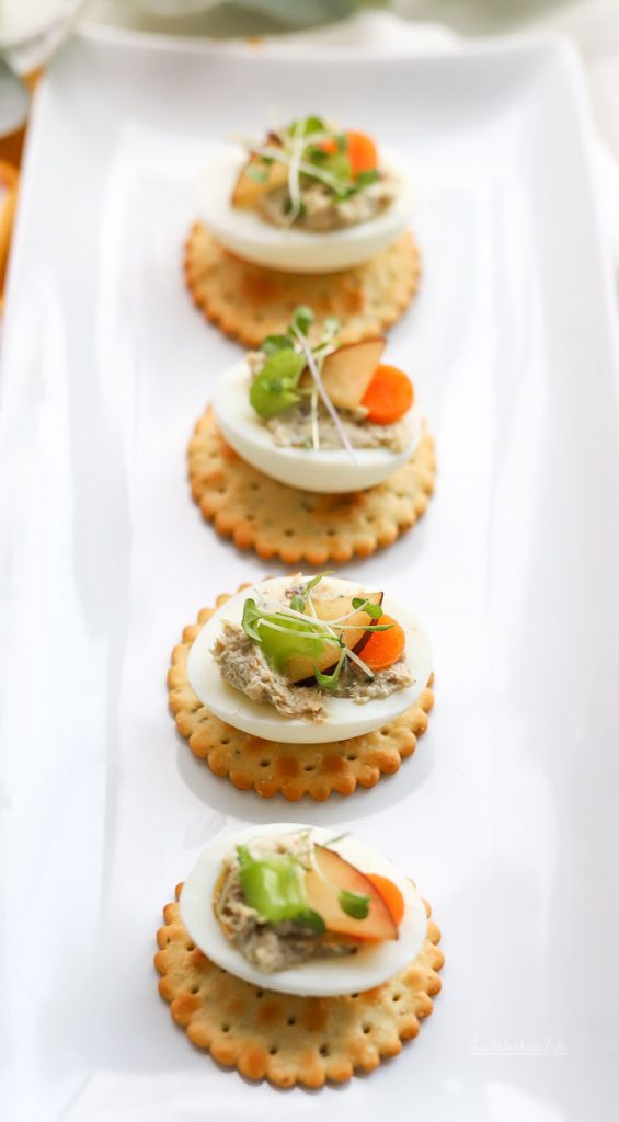 Simple, yet delicious is what we're whipping up and serving as a party appetizer: Chicken Salad Deviled Eggs. We're sharing how to make chicken salad paired with deviled eggs. You can find the recipe down below, and plan to serve this chicken recipe at your next gathering!