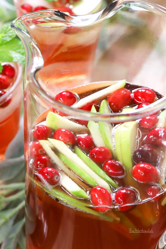 This sweet and festive holiday cocktail is a delicious and sweet Rosé Sangria. Celebrating the holidays just got a little easier with a holiday Sangria, you'll want to drink again and again.