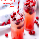 This Cranberry Orange mixed drink is great for the whole family. The perfect holiday mocktail to serve this year, adding fun and cheer to your holiday party.