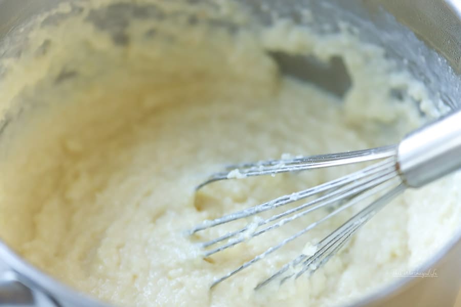 Grits is a staple in our household, but only if they are made a certain way. We're sharing how we make Three Cheese Creamy Grits, a savory southern recipe that is always a huge hit for a brunch idea!