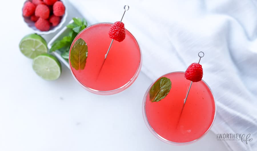 Cure the cold blue with a delicious Cranberry Pink + Raspberry Mojito. This pink cocktail is also great to serve for a Galentine's Day party or pair with Valentine's Day dinner! Cheers!