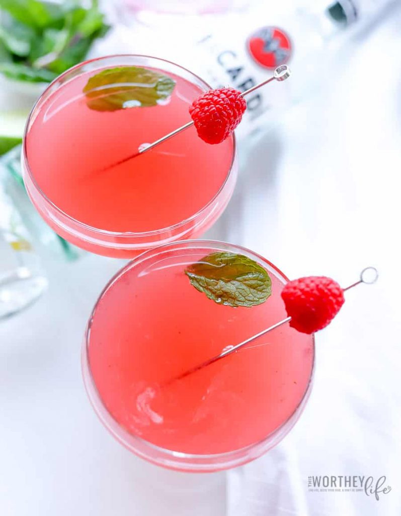 Cure the cold blue with a delicious Cranberry Pink + Raspberry Mojito. This pink cocktail is also great to serve for a Galentine's Day party or pair with Valentine's Day dinner! Cheers!