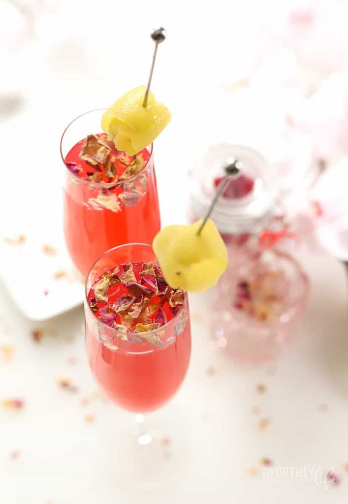 This mocktail is great for Valentine's Day, Galentine's Day, baby showers, or any occasion. Pretty in pink, this Rose Pink Ginger Mocktail is not only delicious to look at, but the taste is simply divine.