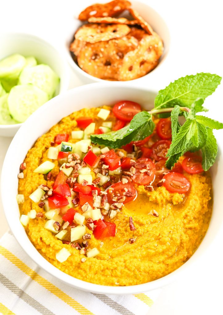 Our delicious carrot-based dip is dressed to impress, and by dressed we mean with all of the fresh veggie toppings you can imagine. Plus a handful of chopped nuts just for fun. Make this wonderful dip just in time for the perfect appetizer for your Easter Sunday supper!