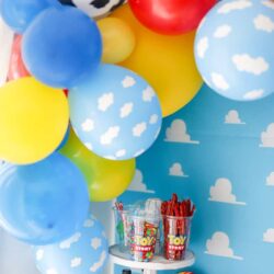 Plan a fun Toy Story themed party with a Toy Story Balloon garland. I'm sharing how to create a balloon garland with a Toy Story theme. It's the perfect pop to any themed party. 