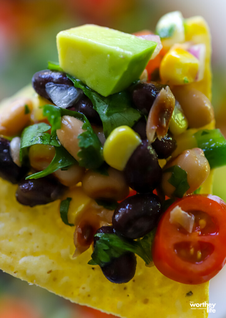 fresh black salad ingredients on a tortilla