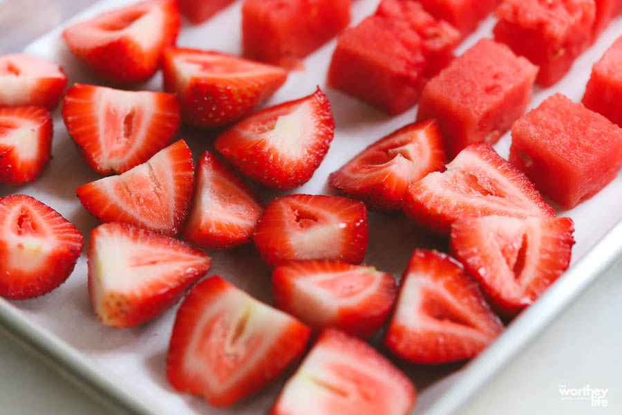 fruit cut watermelon and strawberries on white tray