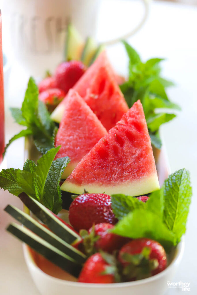 fresh cut fruit on white tray