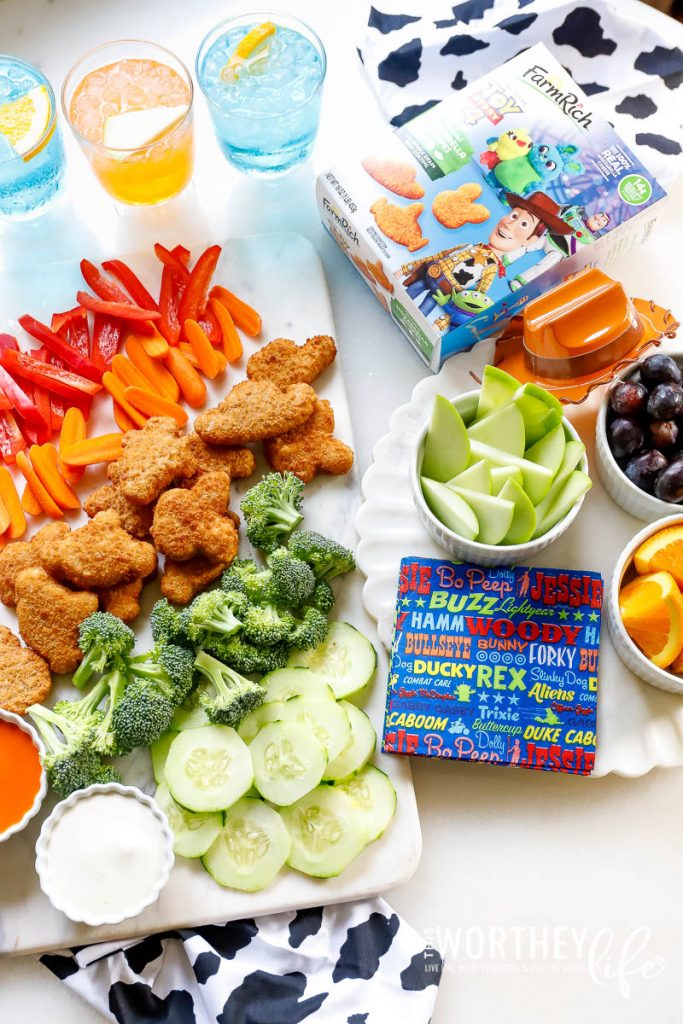 Create a kid-approved snack board featuring Toy Story 4 Mozzarella Shapes from Farm Rich snacks and appetizers. These snacks are perfect for an after-school snack, Toy Story themed party food, or great for the kids’ lunchboxes.