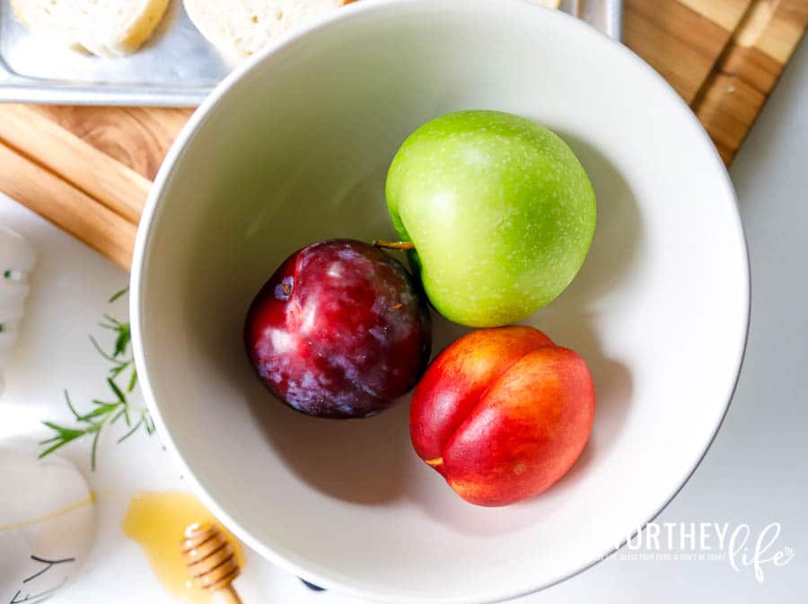 apples in a white bowl