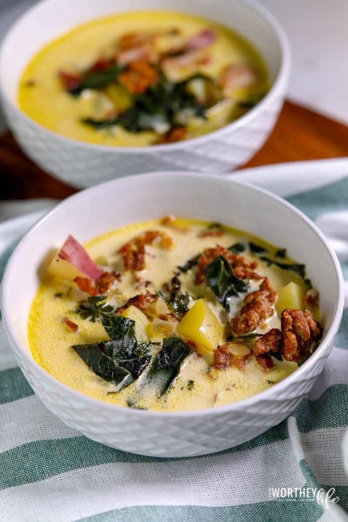 Easy soup recipe using potatoes, italian sausage, bacon, kale and greens