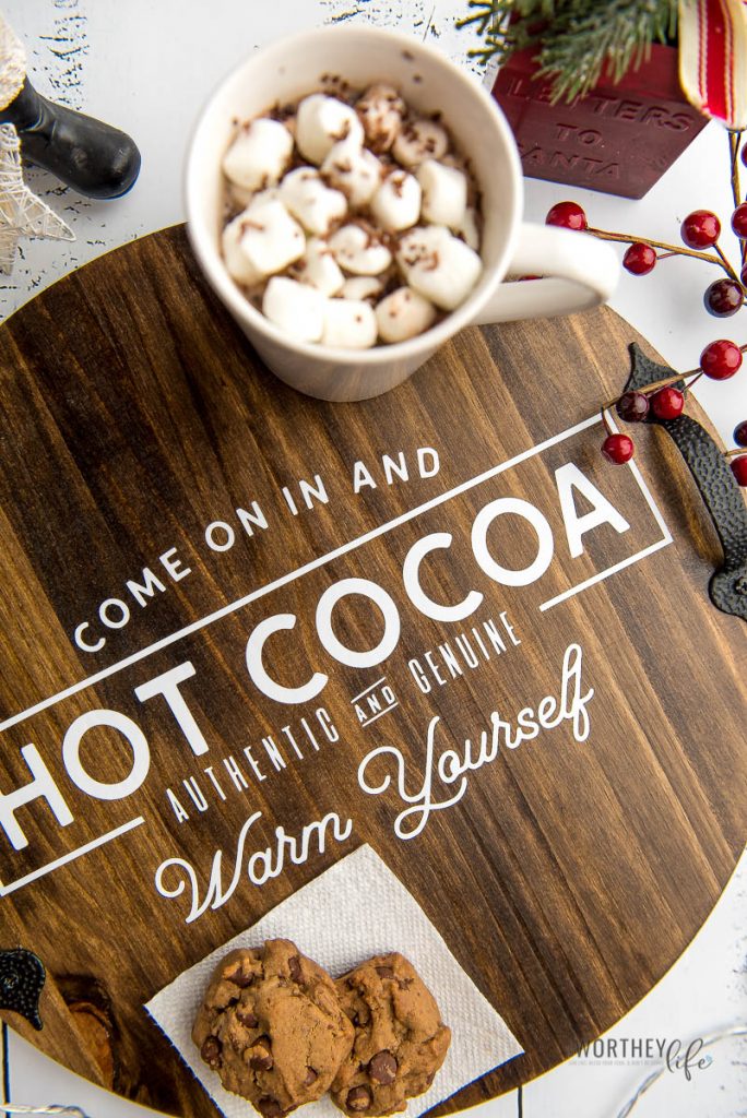 This simple but beautiful DIY Wooden Serving Tray is a perfect way to use your Cricut for adding a special message to your new cocoa serving tray.  I love simple DIY ideas, and this one is a great choice for the holiday season.  It is beautiful but simple, and it is easy enough anyone can make this!