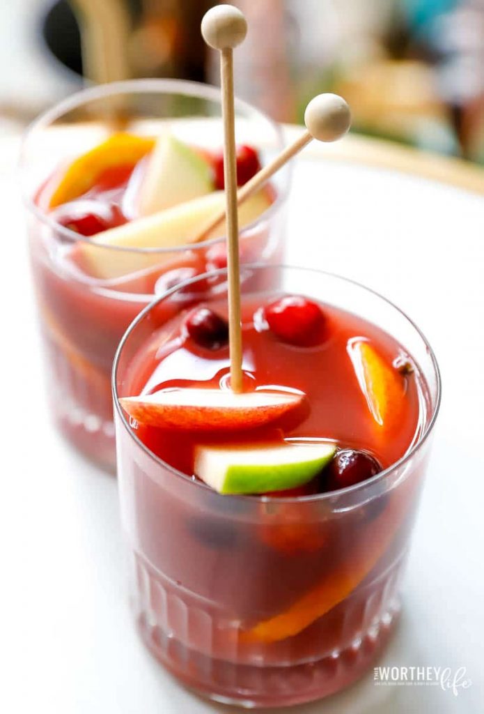 A warm spice sangria mocktail is a great way to keep the chill off this winter. Plus, it's an easy non-alcoholic sangria recipe made in the Instant Pot. With fresh cranberries, apple cider, apples, orange juice, and other easy-to-add ingredients, this sangria is a great holiday mocktail to try this year. 