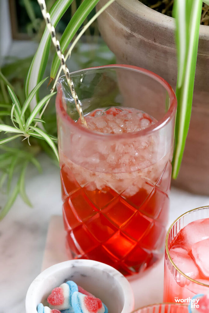 Cocktail ingredients in a cocktail mixing glass