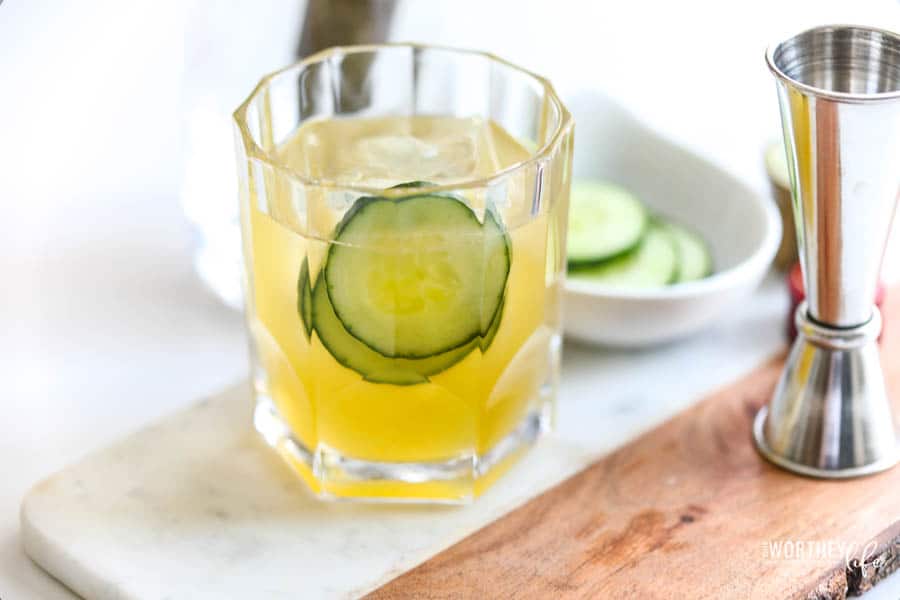 St patrick's day cocktail in a glass on a cutting board