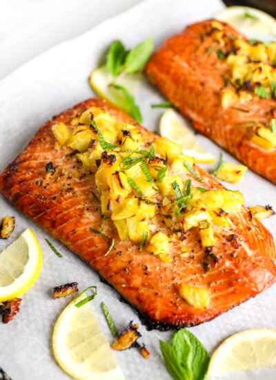 honey pineapple salmon on parchment paper