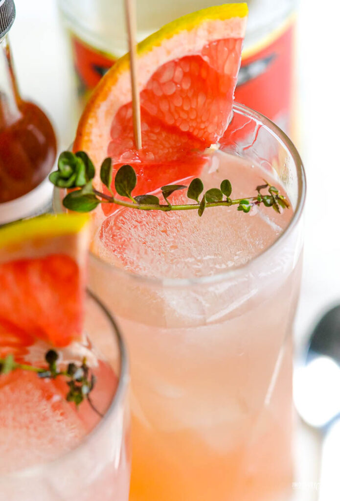 grapefruit drink in a tall frosted glass